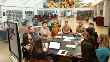 Teachers and staff from UCLA Community School meet with UCLA professors to discuss the various research projects happening at the school.